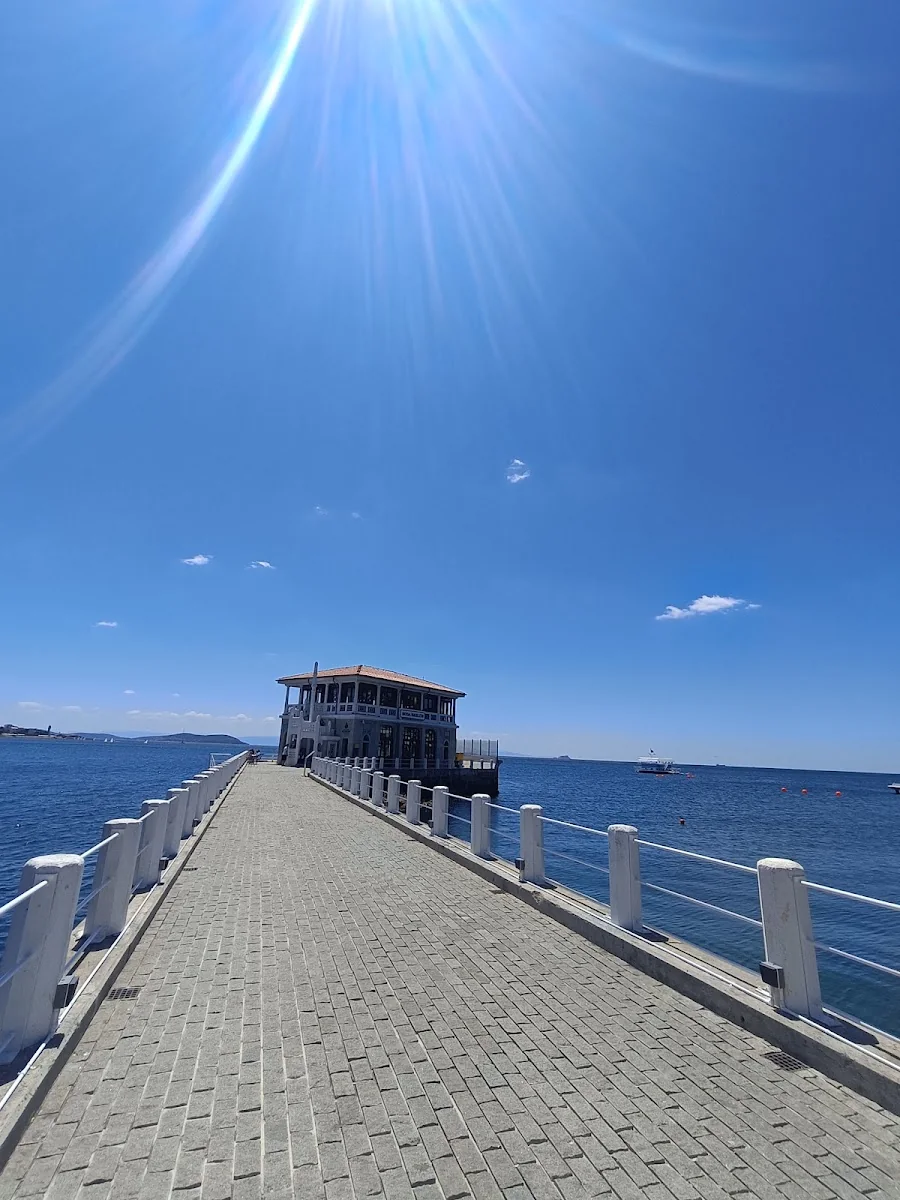 Walking approach to the historic Moda pier beside the sea