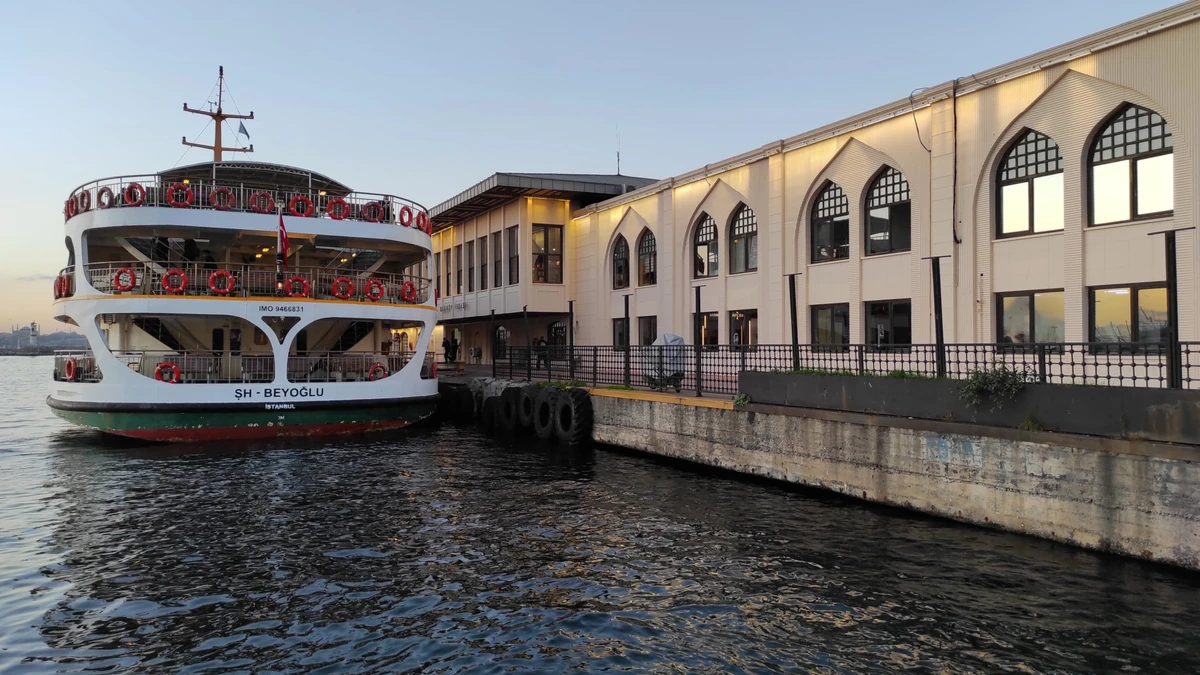 Beyoglu passenger ferry docked beside a waterfront terminal
