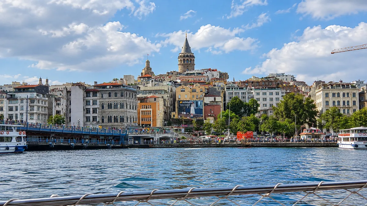 Galata Tower and waterfront buildings viewed across the water in Istanbul